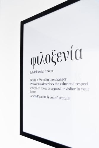 a picture of a frame with the text pugota at Seaside Suites in Kavos