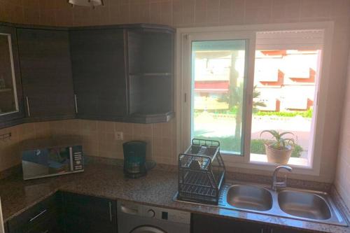 Kuchyň nebo kuchyňský kout v ubytování SUNSET BEACH Résidence Balnéaire