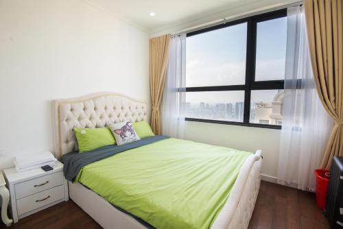 Giường trong phòng chung tại Hanoi D'Capitale Luxury Serviced Apartment