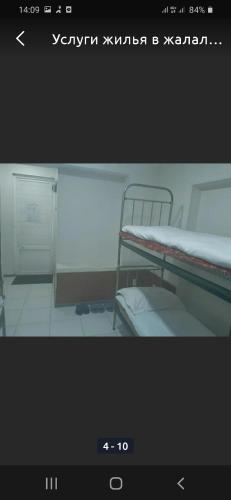 a picture of a room with a bunk bed at Azimut in Jalal-Abad