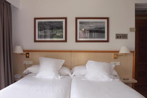 Katil atau katil-katil dalam bilik di Hotel Ezeiza