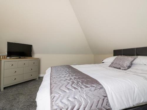 Voodi või voodid majutusasutuse The Hayloft toas