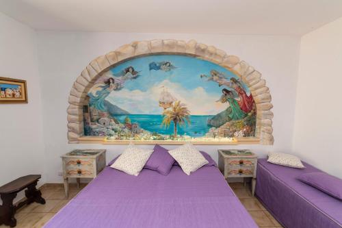 Postel nebo postele na pokoji v ubytování Casa Teresa