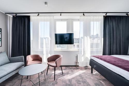 Postel nebo postele na pokoji v ubytování Hotel Fridhem