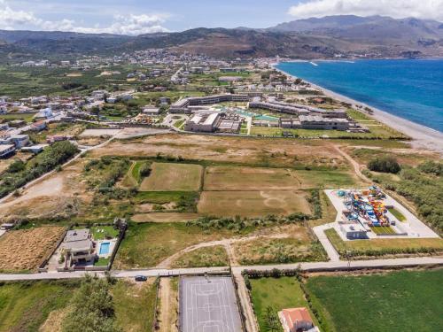 an aerial view of a town next to the ocean at Villa Anthira in Ropanianá