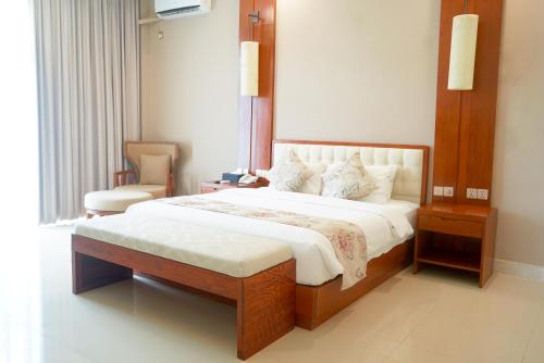 Postel nebo postele na pokoji v ubytování NDC Resort & Spa