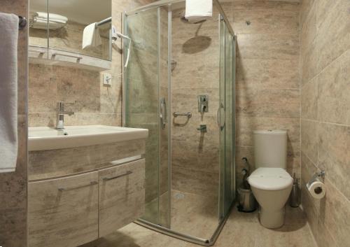 Ванная комната в Burçman Hotel Vişne