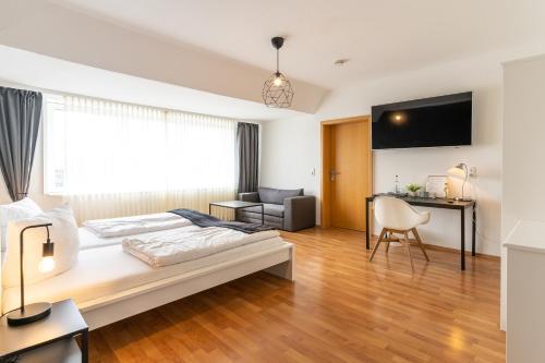 Schäfers Hotelにあるベッド
