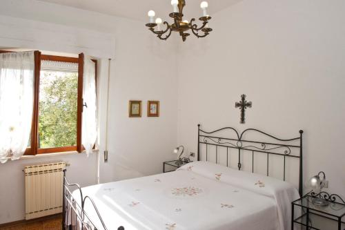 A bed or beds in a room at Nel Giardino Degli Ulivi