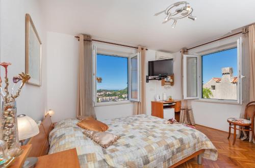 Una cama o camas en una habitación de Sobe na Konalu