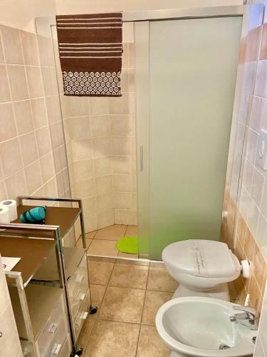 a bathroom with a toilet and a shower at Casa di Marco in Galatina