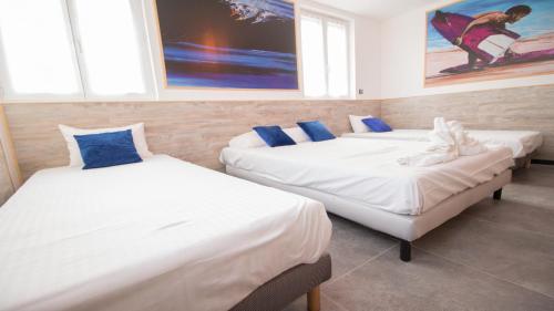 Ένα ή περισσότερα κρεβάτια σε δωμάτιο στο Appartel 76 Dieppe