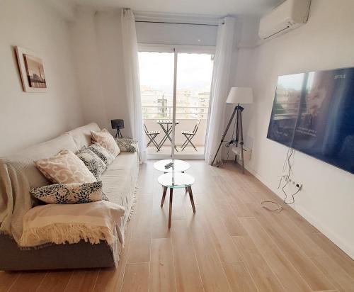 TV a/nebo společenská místnost v ubytování Tarragonaapartments Prim Reus
