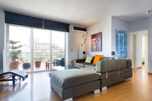 Zona de estar de Acropolis Tony's Penthouse