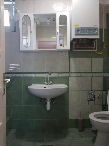 A bathroom at Marie Apartment MEGÚJULT - RENEWED