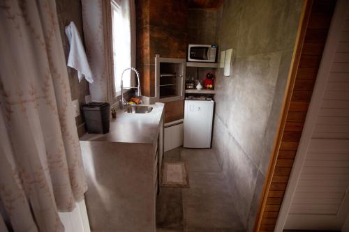 Kuchyň nebo kuchyňský kout v ubytování Sitio do Galdino