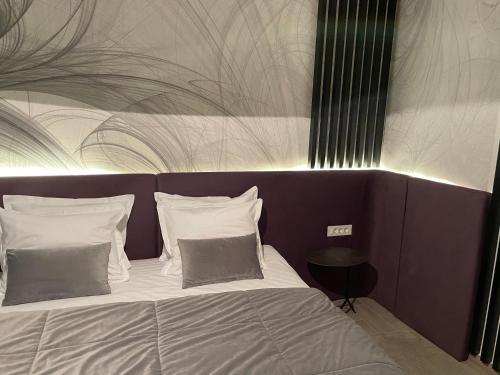 Кровать или кровати в номере Art of Living Luxury suite two