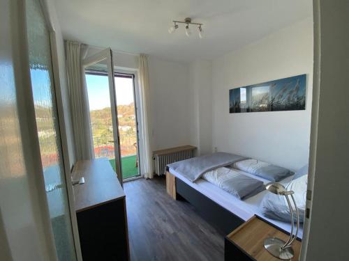 Postel nebo postele na pokoji v ubytování Ferienwohnung Schlossblick Bad Breisig