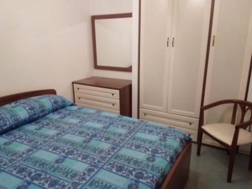Säng eller sängar i ett rum på Casa Antonella Caronia Marina