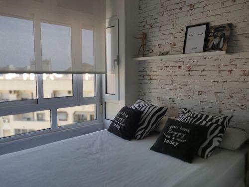 Ein Bett oder Betten in einem Zimmer der Unterkunft Best Apartment Ever Torremolinos