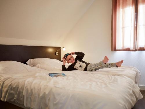 Postel nebo postele na pokoji v ubytování Beautiful child-friendly villa, located in Limburg