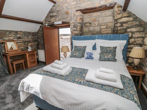Postel nebo postele na pokoji v ubytování Granary Cottage