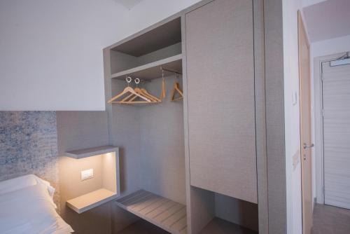 Postel nebo postele na pokoji v ubytování Residence Cristine