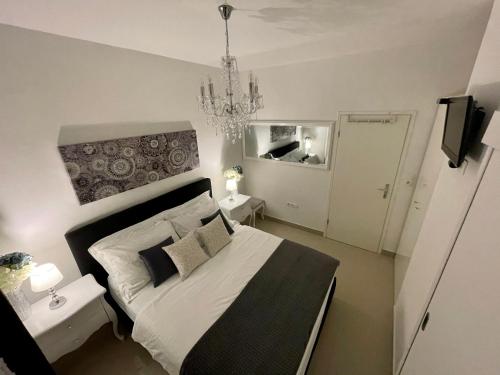 Ένα ή περισσότερα κρεβάτια σε δωμάτιο στο Central Square Guest House
