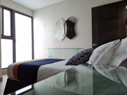 Casa Arandas Hotel - Suitsにあるベッド