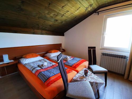 Ένα ή περισσότερα κρεβάτια σε δωμάτιο στο Apartments Zuppy