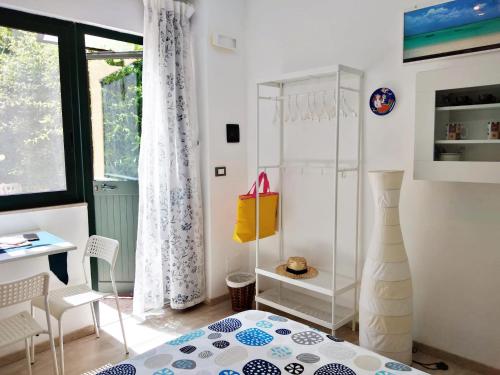 Posteľ alebo postele v izbe v ubytovaní Il Giardino di Laura Private Rooms Mondello
