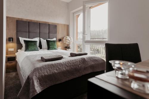 Postel nebo postele na pokoji v ubytování NOVA Apartamenty&Pokoje