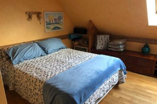 מיטה או מיטות בחדר ב-Location maison 2 chambres