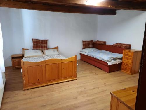 Ліжко або ліжка в номері Letti Vendégház
