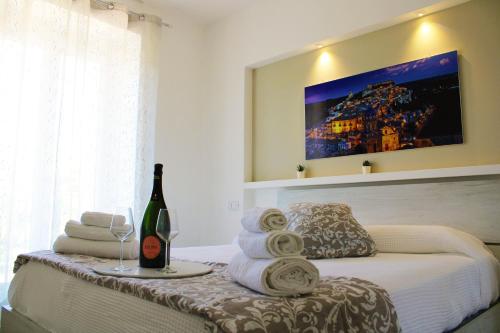 A bed or beds in a room at Visum Hyblea