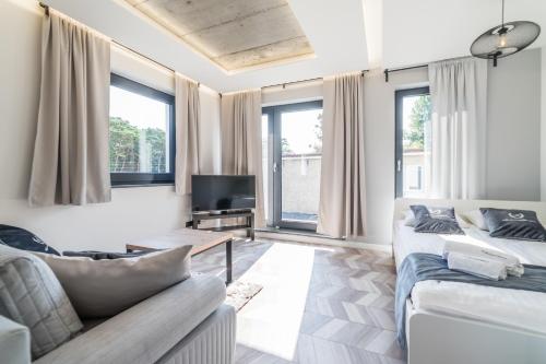 Μια τηλεόραση ή/και κέντρο ψυχαγωγίας στο Apartamenty Gdansk EU- Apartamenty Jelitkowska 11, 200m od morza