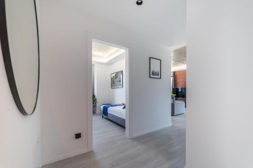 Ένα ή περισσότερα κρεβάτια σε δωμάτιο στο Apartamenty Gdansk EU- Apartamenty Jelitkowska 11, 200m od morza