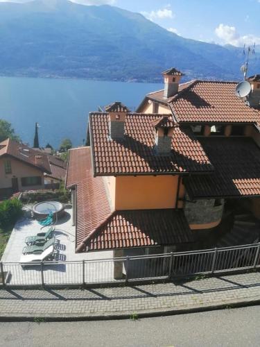 a house with a view of the water at B&B Villa Anita in Bellano
