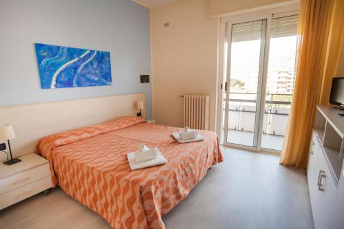 Katil atau katil-katil dalam bilik di Residence La Palma