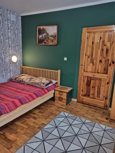 Posteľ alebo postele v izbe v ubytovaní Bora Zdrój - apartament