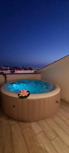 a large tub with a flower in the middle at Residence Provencal - Luxurious - 300m Palais - LRA CANNES in Cannes
