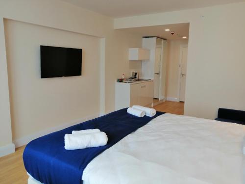 Postel nebo postele na pokoji v ubytování Subtropik Apartments in Batumi