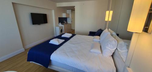 Postel nebo postele na pokoji v ubytování Subtropik Apartments in Batumi