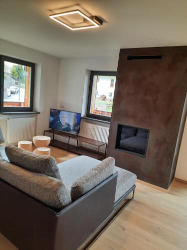 TV a/nebo společenská místnost v ubytování Luxury Apartment Daema