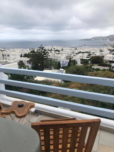a balcony with a view of a city at Ibiscus Boutique in Mýkonos City