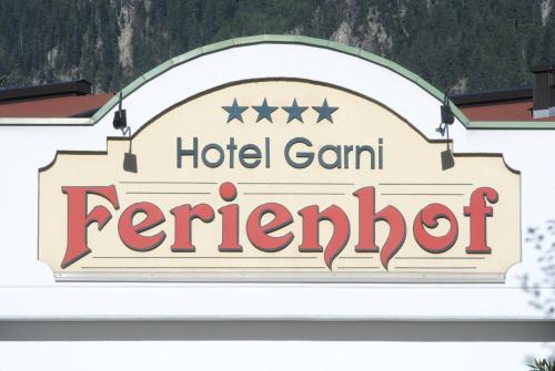 a sign for a hotel gamin ferret at Hotel Garni Ferienhof in Mayrhofen