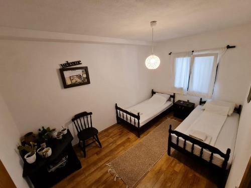 Un pat sau paturi într-o cameră la Lux Apartment Sunset
