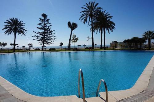 The swimming pool at or close to Castillo de Santa Clara