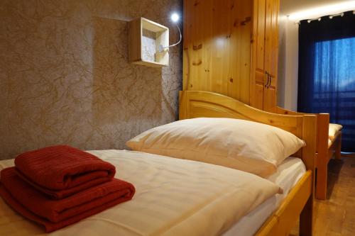Postel nebo postele na pokoji v ubytování Tatralandia Apartmány Relax