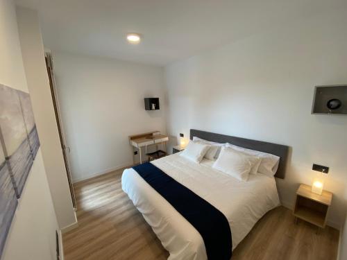 Postel nebo postele na pokoji v ubytování Vianetto Home